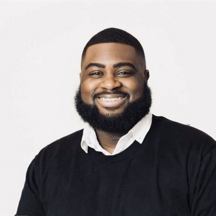 Tino Lyons smiling